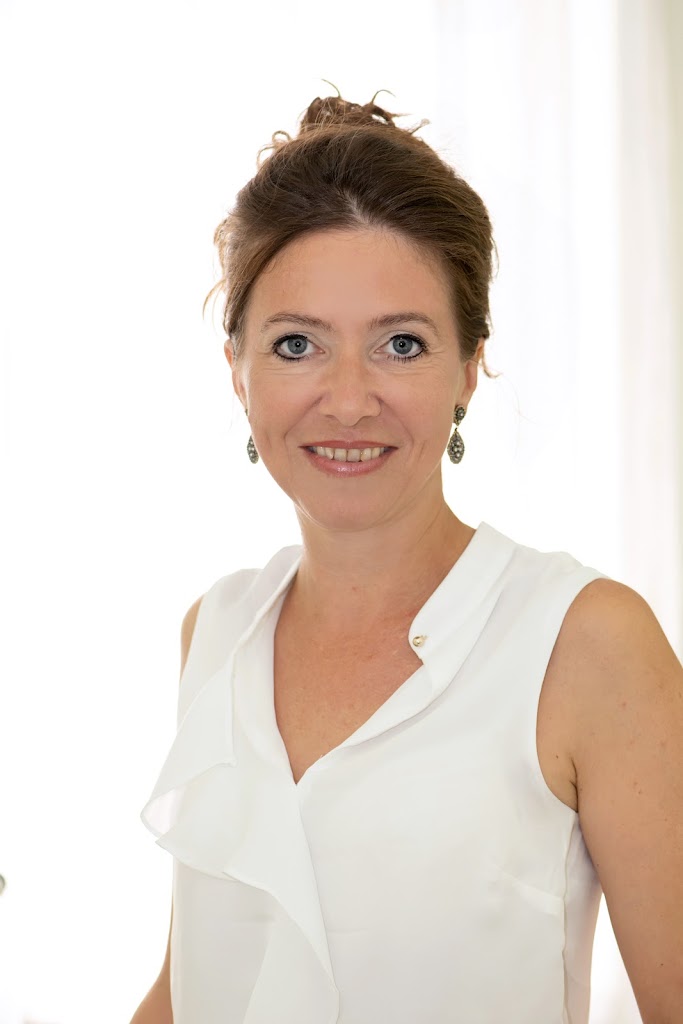 Dr. Tina Idris